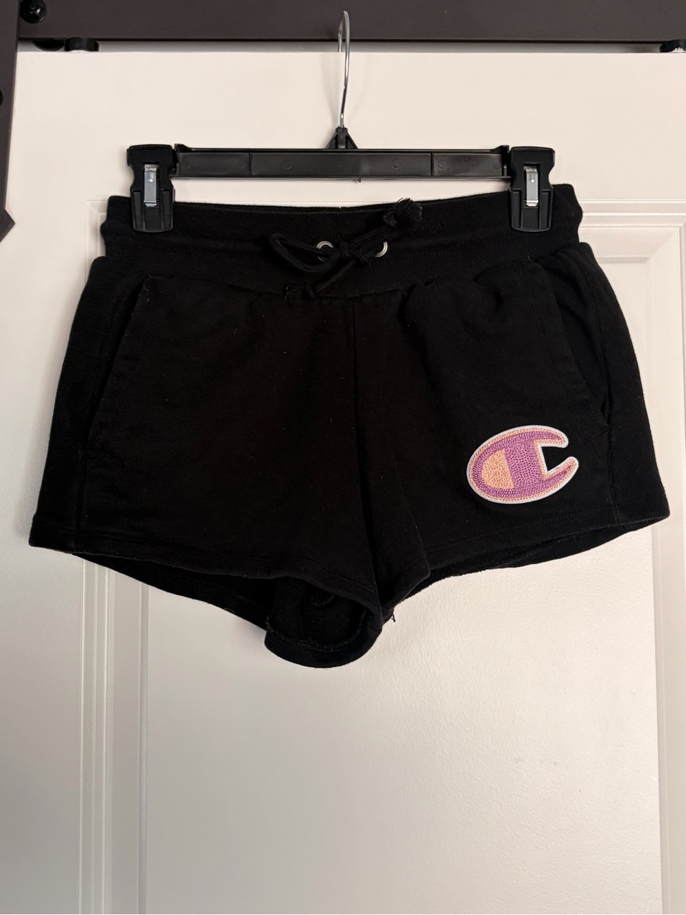 Champion Black Athletic Shorts with Pink Logo Patch